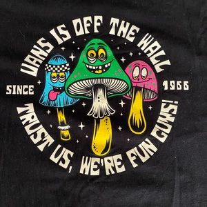 black shirt sleeve vans off the wall t-shirt